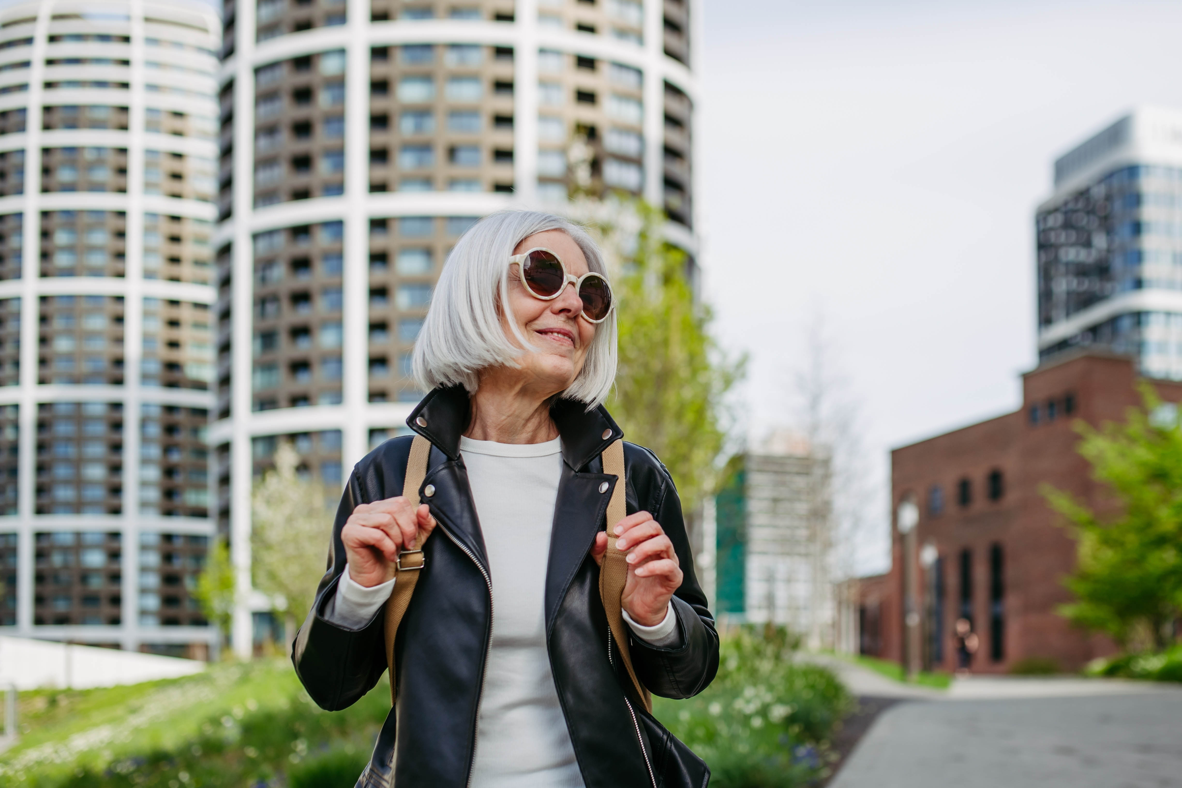 Happy middle aged woman outside, living her best life Happy middle aged woman outside, living her best life